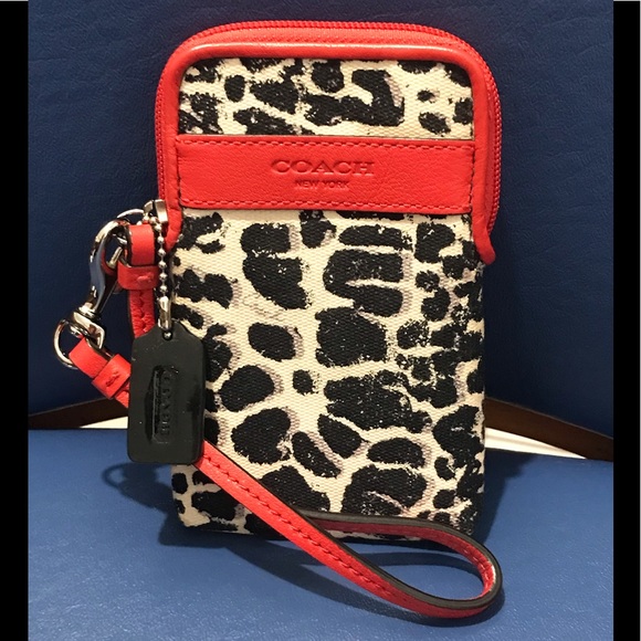 Coach Handbags - Coach ocelot-print univ case/wristlet